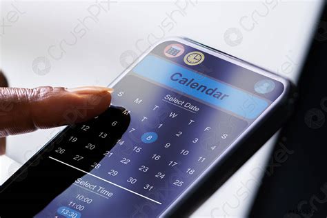 African American Person Looking In Calendar - stock photo | Crushpixel