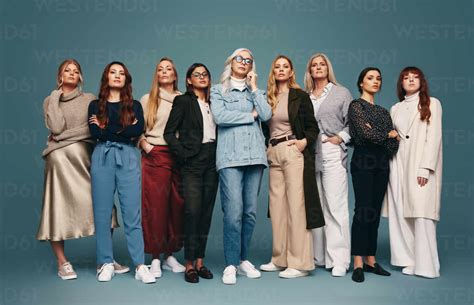 Diverse group of women standing together in a studio. Group of strong ...